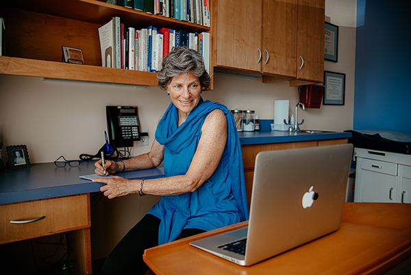 Doctor Kristy Fassler administering Naturopathic prescriptions